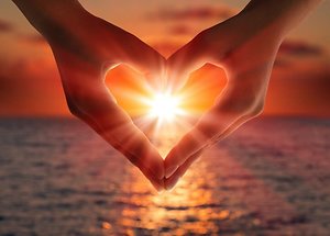 Relationship Counselling. heart shaped hands sunset